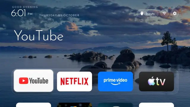 Home screen at 6:01 p.m.: Lake Tahoe at dusk, greeting Good evening