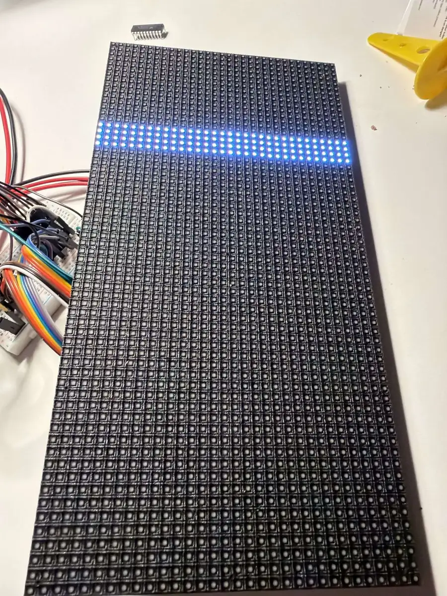 The panel dark except for a single lit band near the top